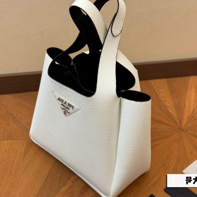 PRA 25 BASKET BAG IN WHITE CALFSKIN | Studio Nafay